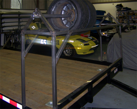 Tire rack for a race trailer.